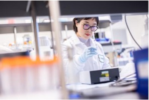 A picture of a scientist working in a lab